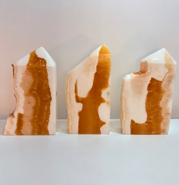 Orange Calcite Towers with Raw Edge
