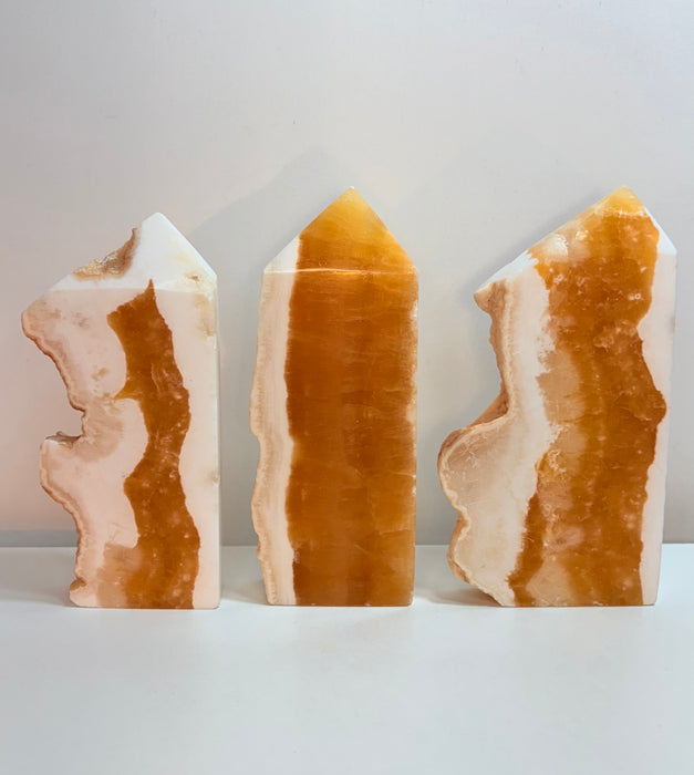 Orange Calcite Towers with Raw Edge